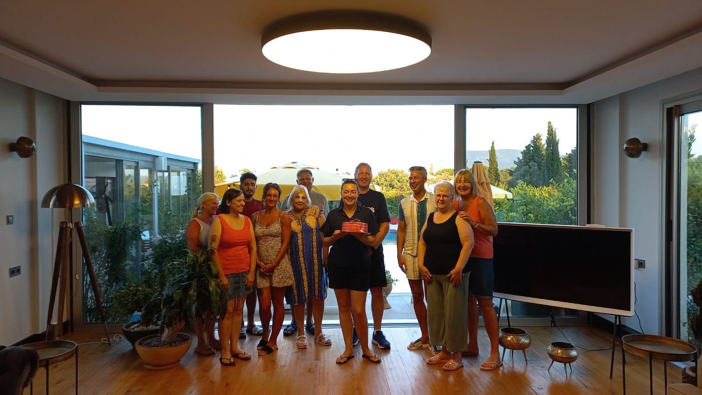 Guests and team together in the lounge at Mandarin Grove