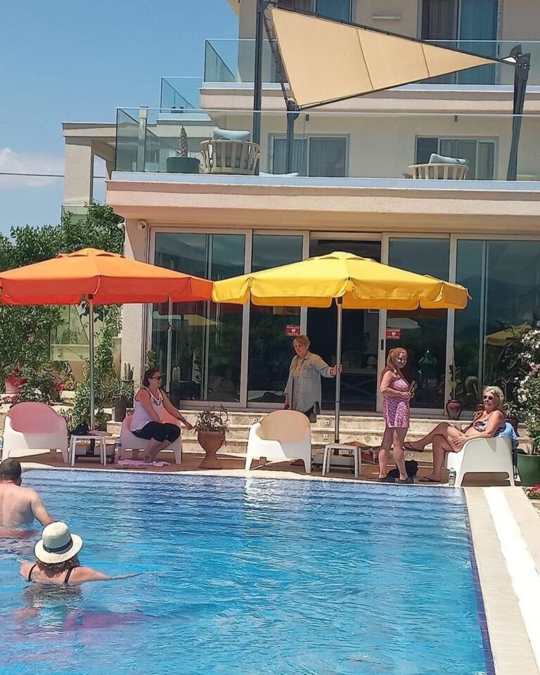 Guests swimming in the pool