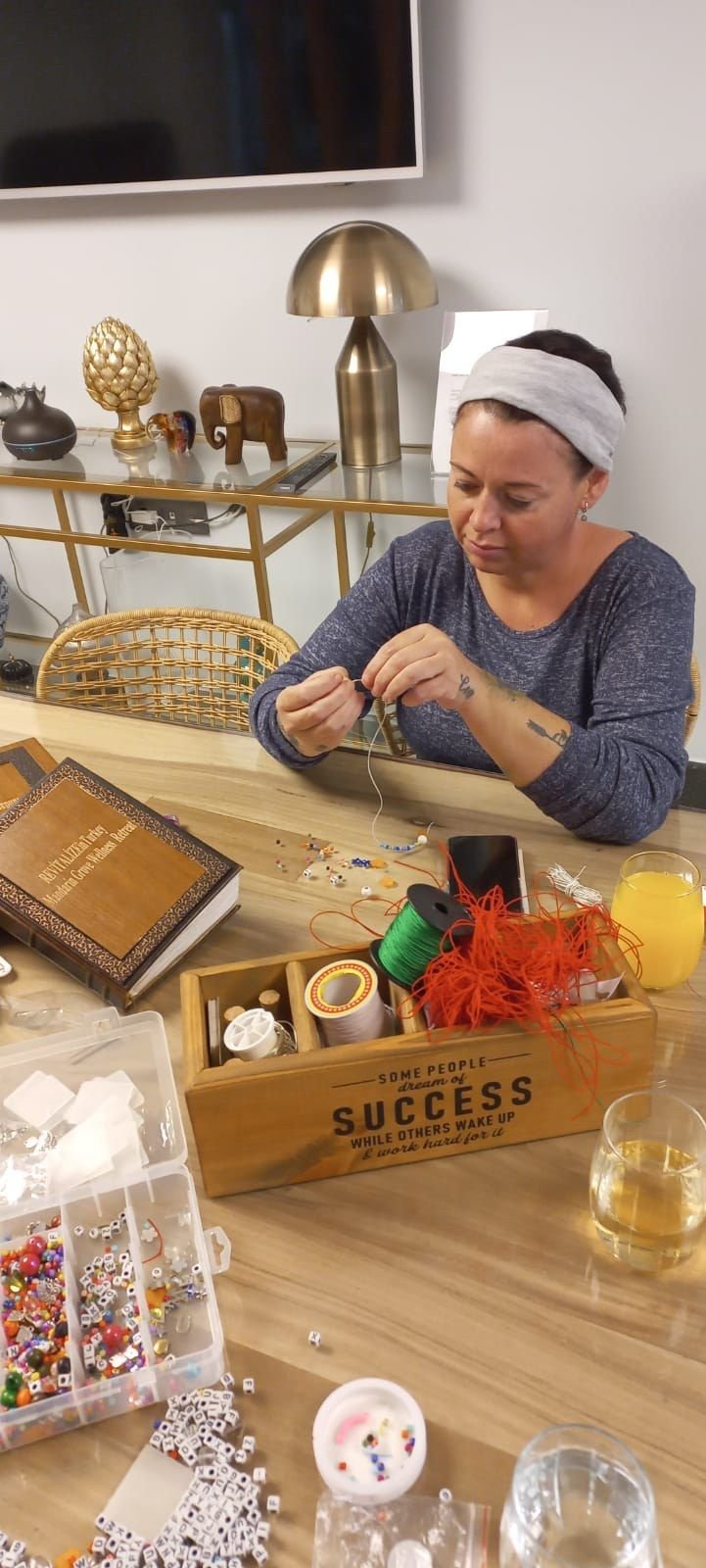 Guests at a jewellery-making afternoon